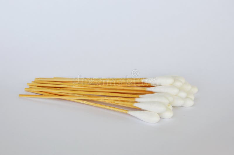 Cotton Bud with Long Wooden Stick on White Background Stock Photo