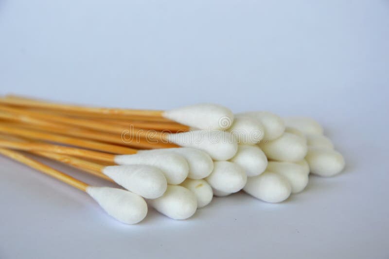 Cotton Bud with Long Wooden Stick on White Background Stock Photo