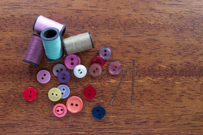 Cotton, Buttons and Sewing Needles on a Wooden Darning Table Stock Image Image of object