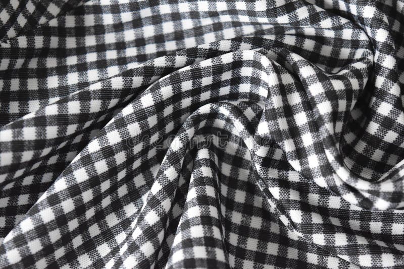 Cotton Fabric Natural and Has a Soft Ripple. Grid Pattern Black and