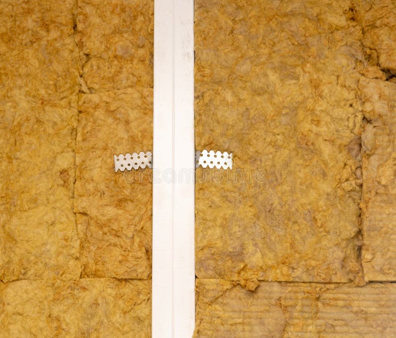 Cotton Wool Insulation in the Wall at a Construction Site Stock Photo
