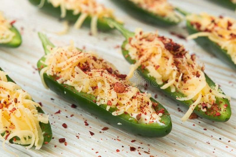 Cooking fresh fried jalapeno poppers with cheese. Cooking fresh fried jalapeno poppers with cheese