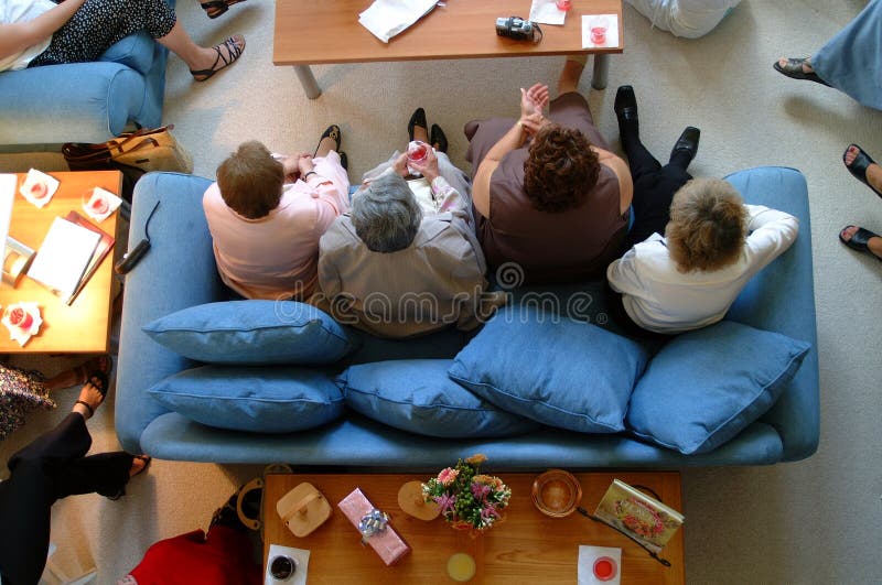 Two Couch Potatoes stock image. Image of drink, control 26519037