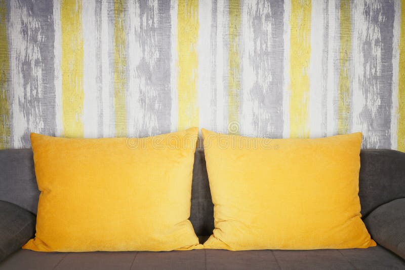 Couch with Yellow Pillows and Wallpaper Stock Image Image of pattern