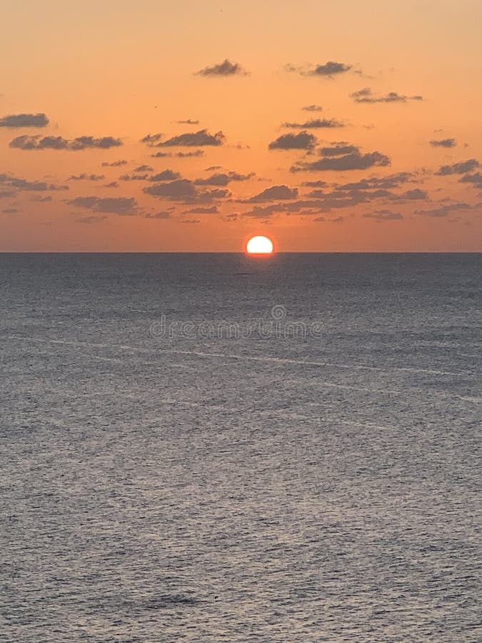 Coucher du soleil au jour chaud de mer images libres de droits Coucher du soleil au jour chaud de mer images libres de droits