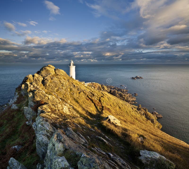 Coucher du soleil au point de début sur la côte sud du ` s de Devon images stock