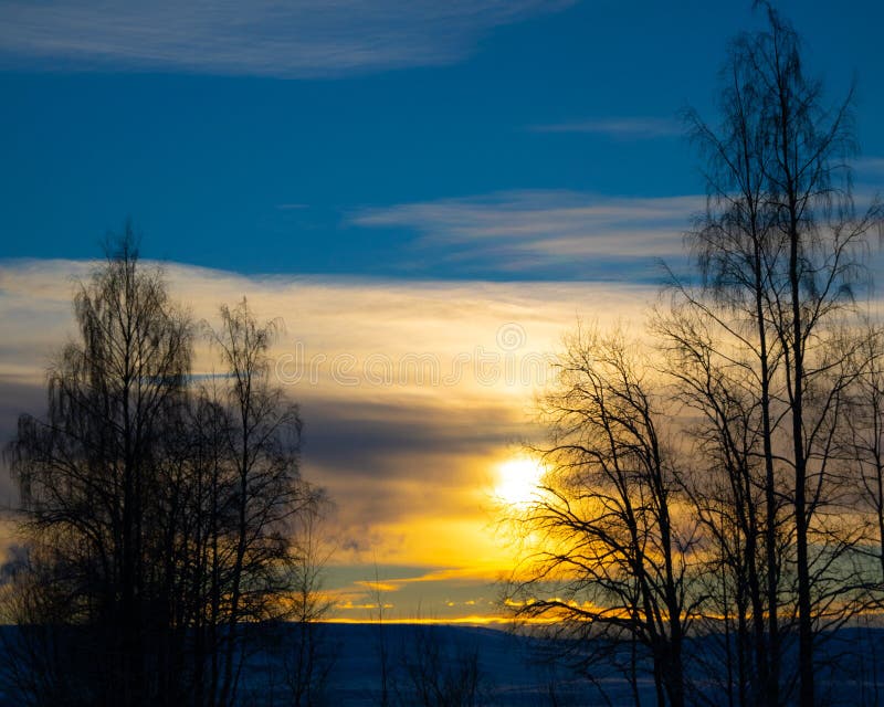 Coucher du soleil d'hiver dans le nord photographie stock Coucher du soleil d'hiver dans le nord photographie stock