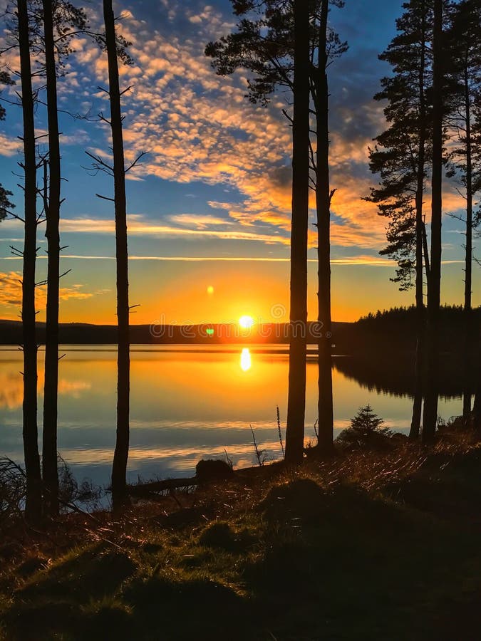 Coucher du soleil à l'eau de Kielder, parc du Northumberland, Angleterre photos stock Coucher du soleil à l'eau de Kielder, parc du Northumberland, Angleterre photos stock