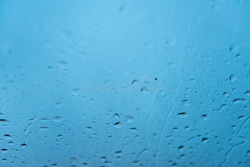 Couleur de refroidissement bleu Eau de pluie en arrière-plan photographie stock libre de droits Couleur de refroidissement bleu Eau de pluie en arrière-plan photographie stock libre de droits