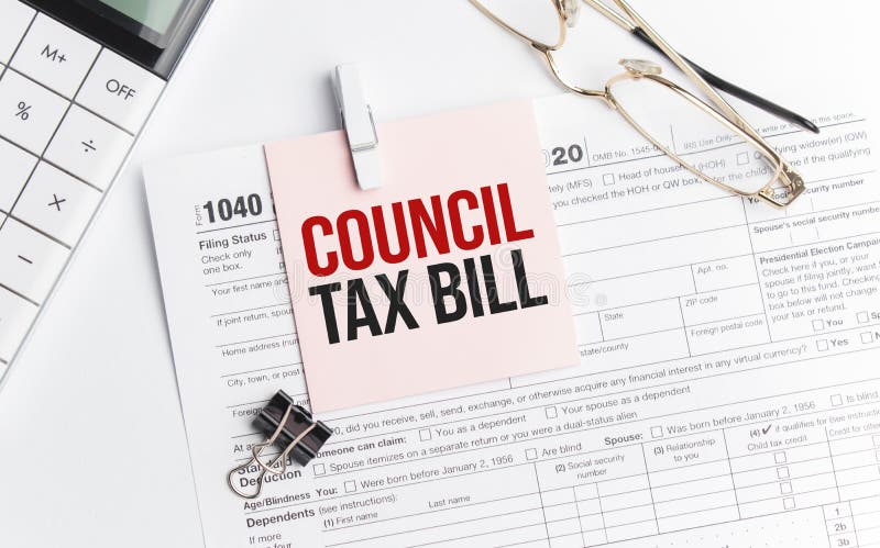 council-tax-bill-with-pen-calculator-glass-and-sticker-tax-report