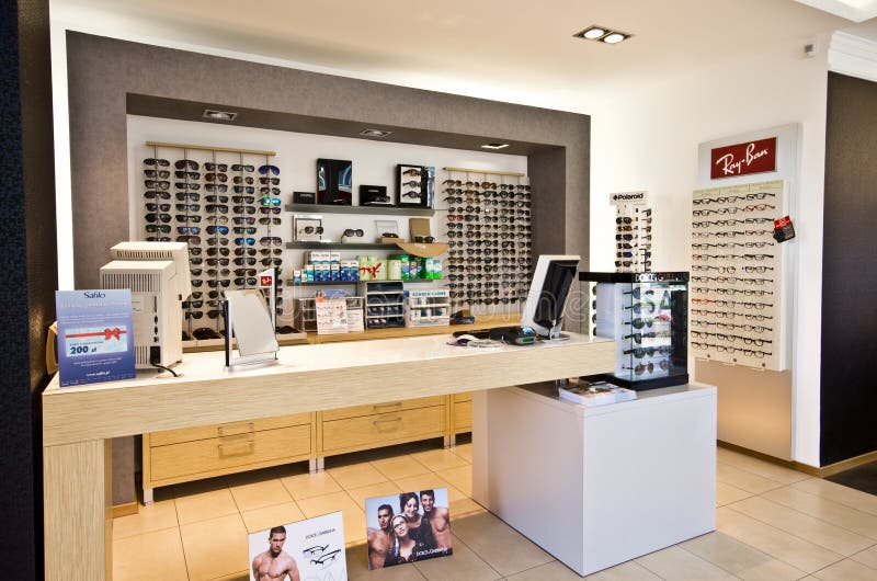 Counter in optician shop editorial photo. Image of racks - 57938526