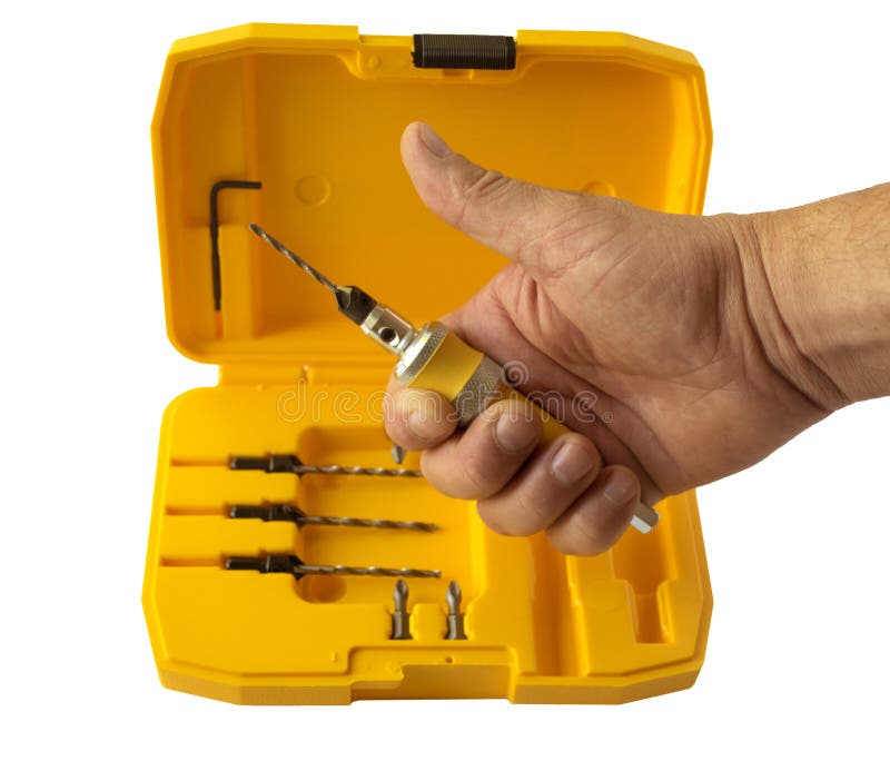 ..The countersink set consists of a nozzle for a quick change of the drill bit and a set of interchangeable countersink drills. stock image ..The countersink set consists of a nozzle for a quick change of the drill bit and a set of interchangeable countersink drills. stock image
