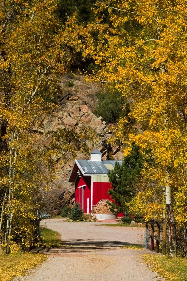 Country Barn and Rural Road in Autumn
