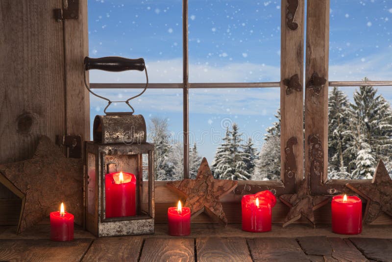 Country Christmas decoration: wooden window decorated with red c