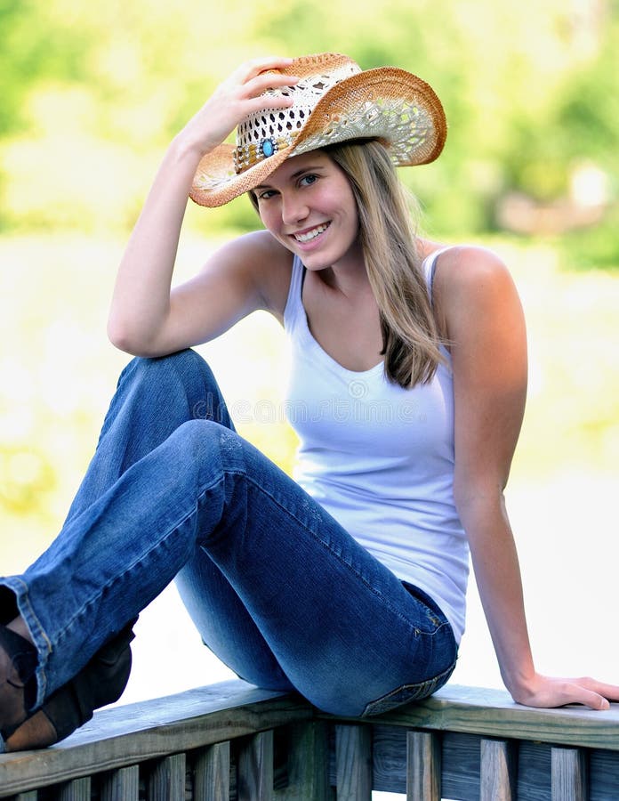 Country Girl Sitting on Dock Stock Image - Image of sitting, attractive ...