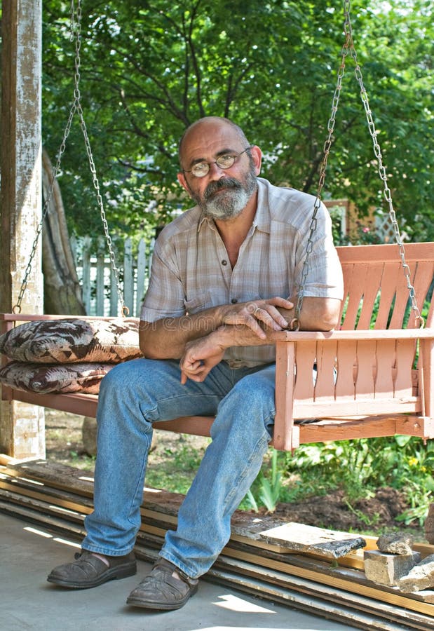 Country Man on Porch Swing