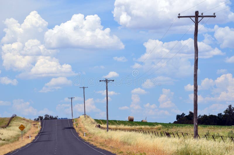 Summer heat haze on a country road through farmland