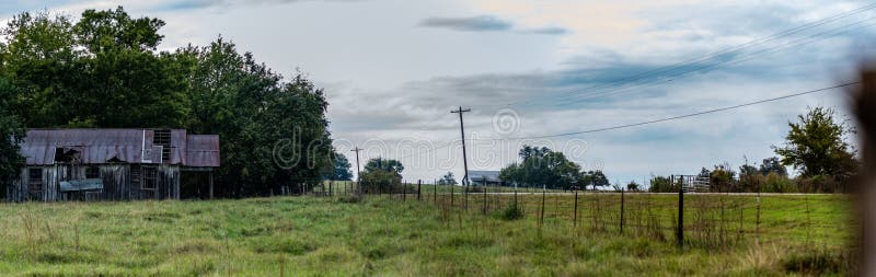 Country rural panorama with abandoned house