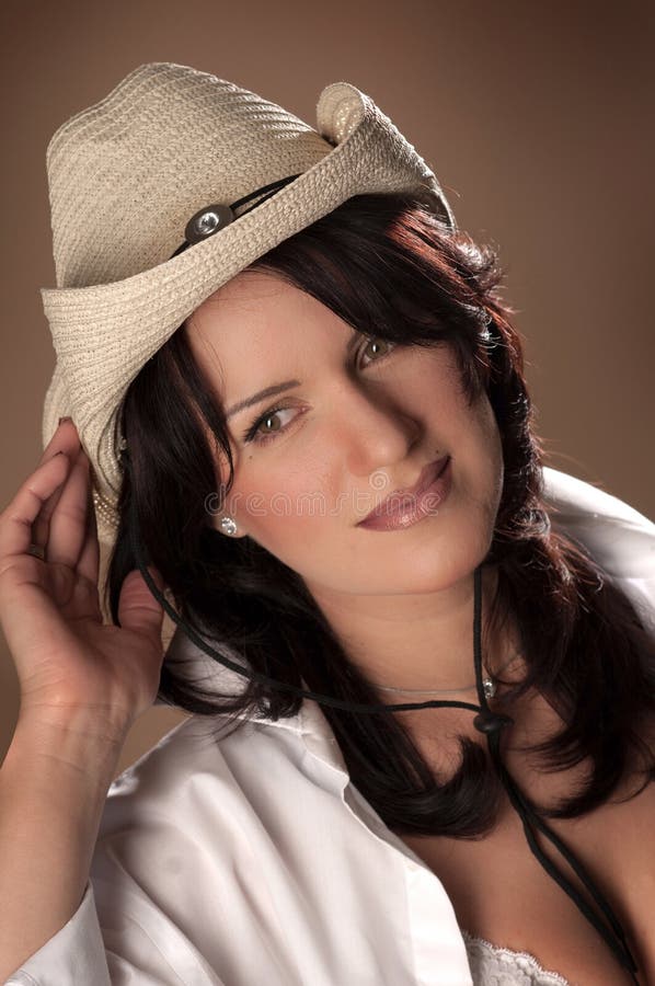 Country stile girl with a straw hat