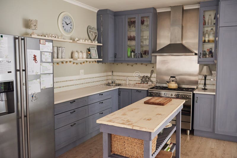 Country style kitchen with with an island in a home