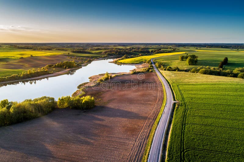 Countryside road through fields, aerial