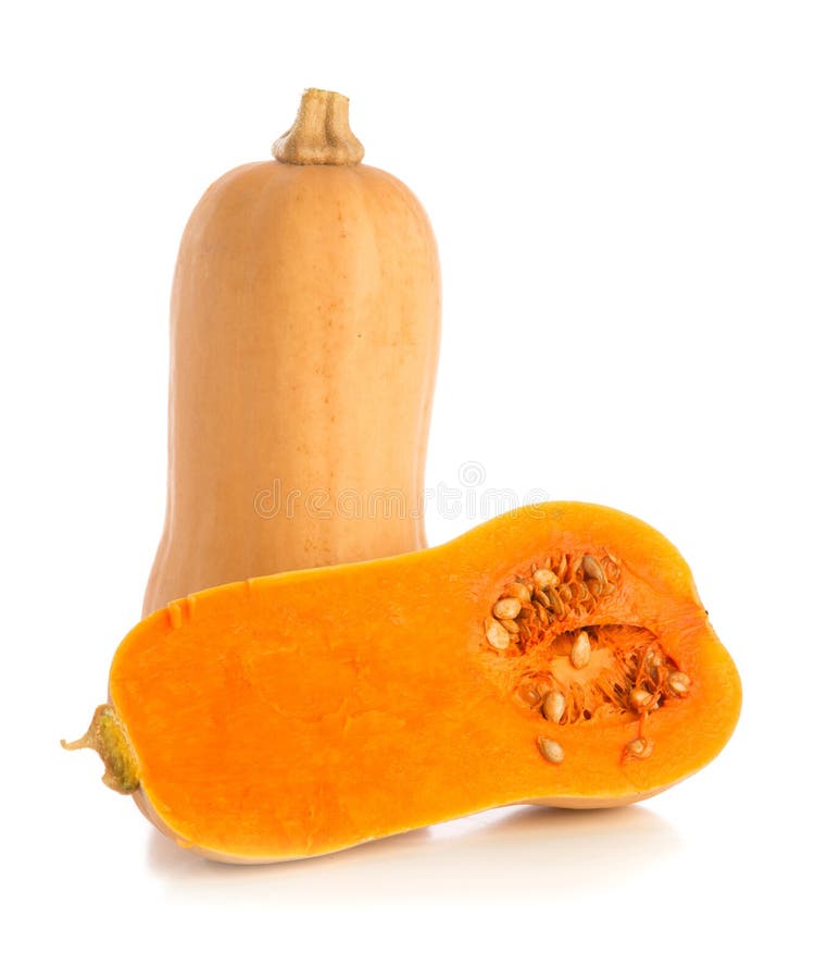 Coupe prête à cuisiner de Butternut dans la moitié photos libres de droits Coupe prête à cuisiner de Butternut dans la moitié photos libres de droits