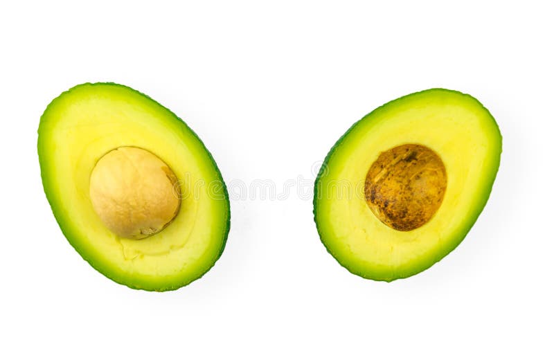 Coupez les tranches d'avocat d'isolement sur le fond blanc photographie stock Coupez les tranches d'avocat d'isolement sur le fond blanc photographie stock
