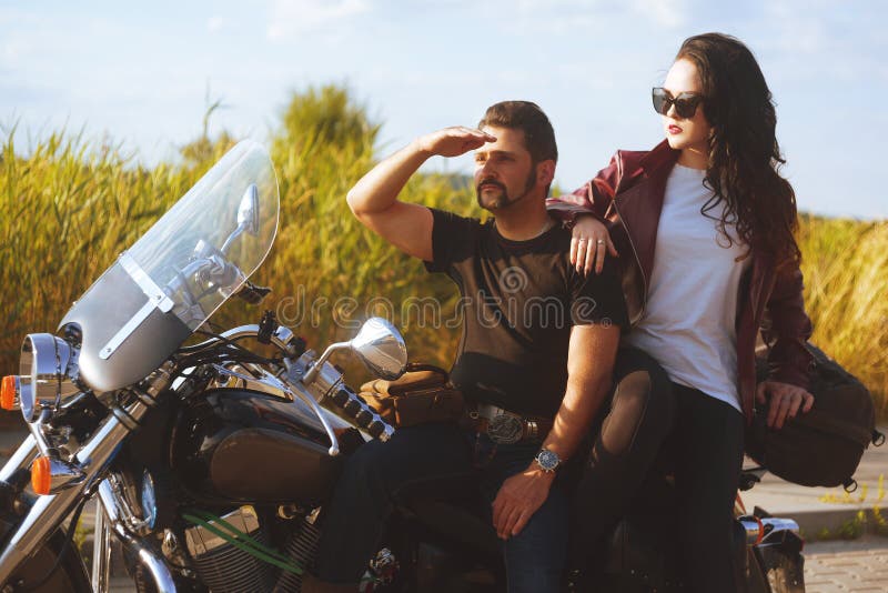 Couple on the Background of the Field Stands Near the Motorcycle. Traveling  on Bikes. Lifestyle, Travel Stock Image - Image of girl, friends: 153245691