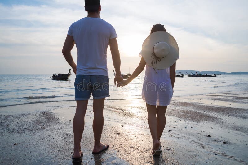 Couple Beach Summer Vacation, Man Woman Holding Hands Sunset Young Guy Girl Back Rear View