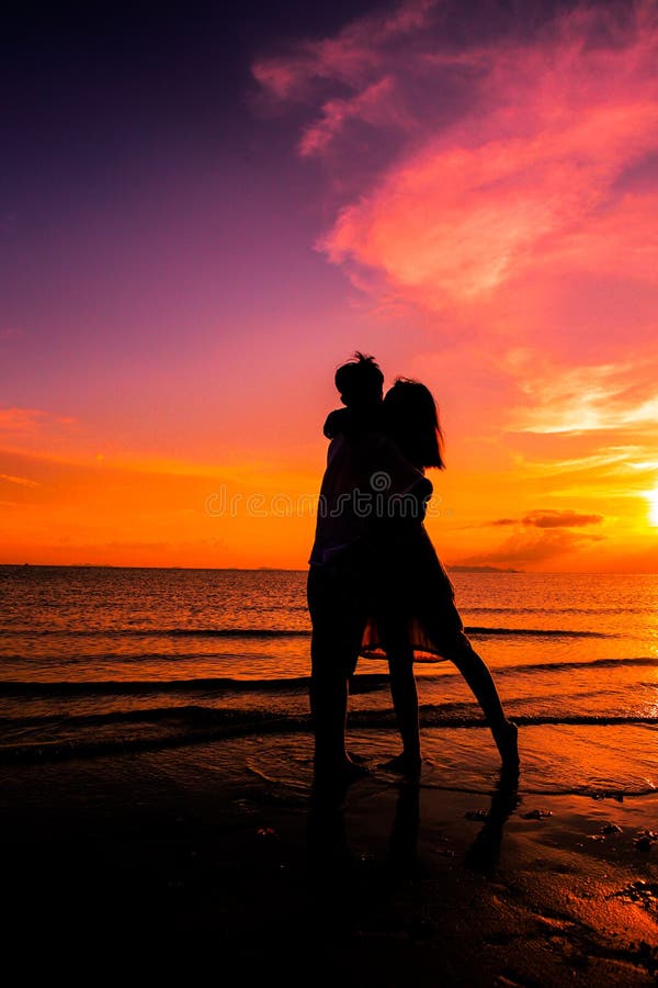 Couple On The Beach At Sunset Silhouettes Romantic Summer Stock Image Image Of Outdoor Sunny 