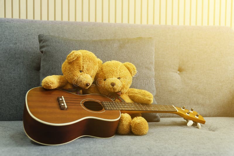 Couple bears playing guitar at home. Love, wedding and valentine symbol. Holiday background stock photos Couple bears playing guitar at home. Love, wedding and valentine symbol. Holiday background stock photos