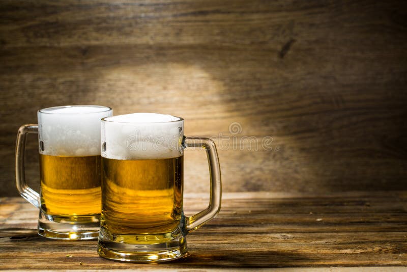 Couple of beers on standing wooden table