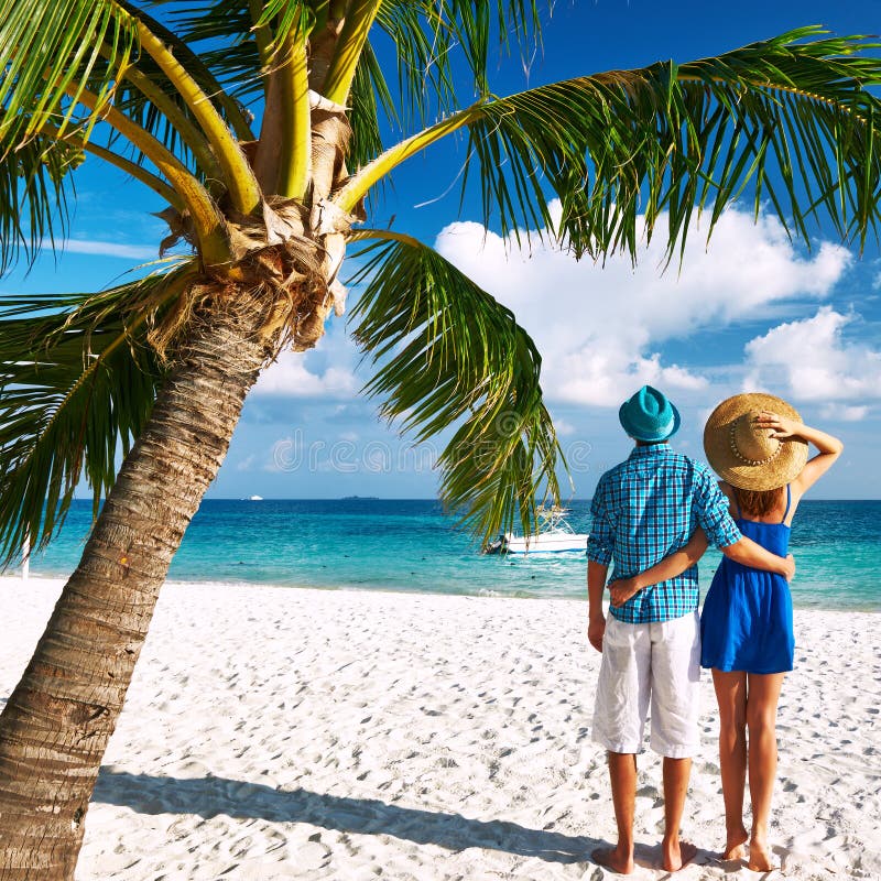 Couple in Blue Clothes on a Beach at Maldives Stock Image - Image of ...
