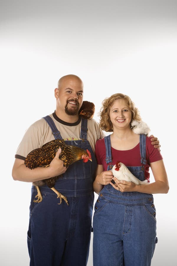 Couple with chickens.