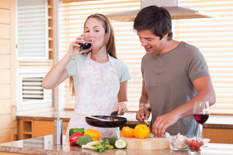 Couple Cooking Dinner while Drinking Wine Stock Image Image of happy