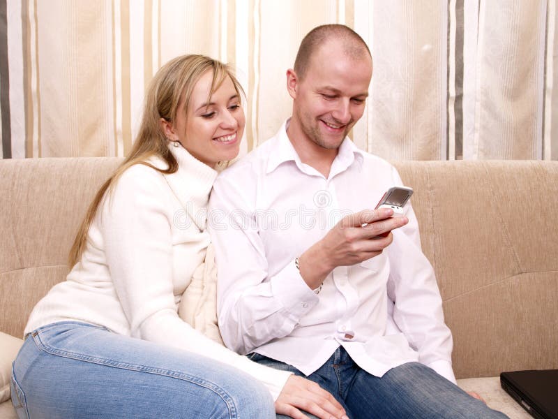 Couple on the couch. royalty free stock image