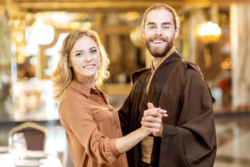 Couple dancing during a celebration at the restaurant stock images Couple dancing during a celebration at the restaurant stock images