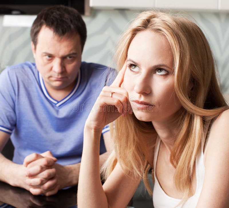 Conflict between men and women at home. Couple divorce