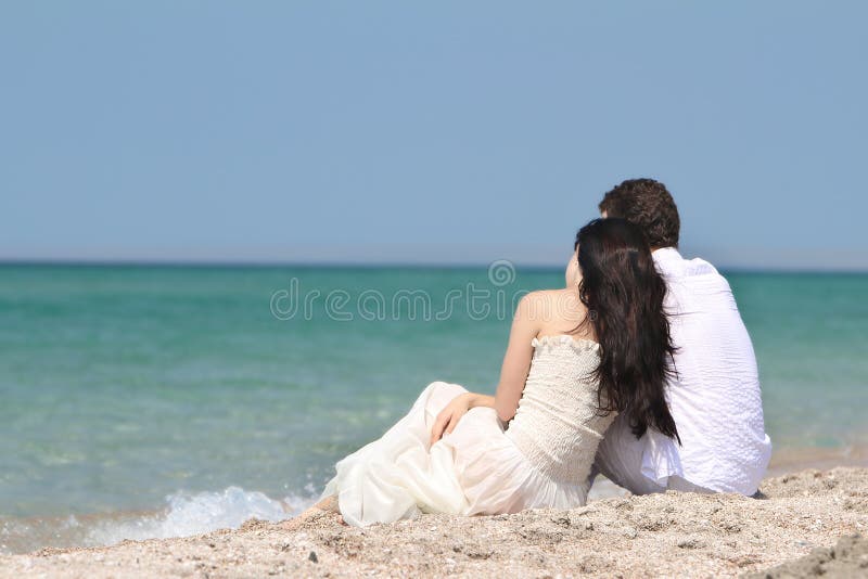 Couple dreaming on beach