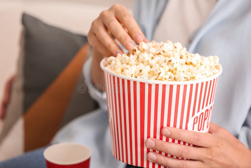 Couple Eating Popcorn at Home, Closeup Stock Photo Image of indoors