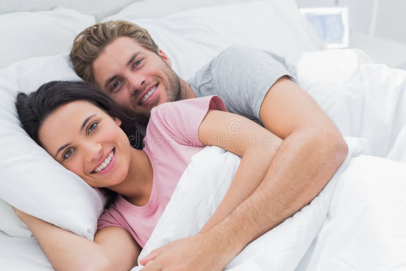 Couple embracing in bed stock photo. Image of hair, hugging 31669666