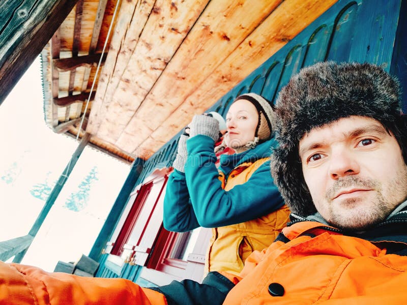 Couple enjoying drink on a winter day royalty free stock photos Couple enjoying drink on a winter day royalty free stock photos