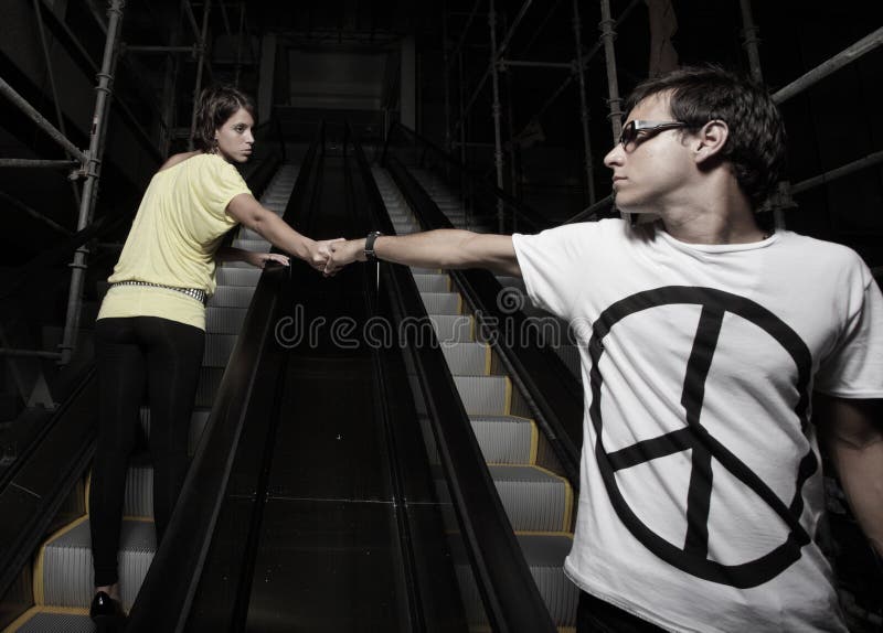 Couple on an escalator