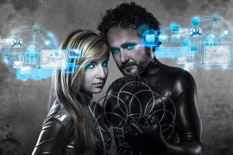 Couple of futuristic lovers, in latex dress. Black and silver royalty free stock images Couple of futuristic lovers, in latex dress. Black and silver royalty free stock images