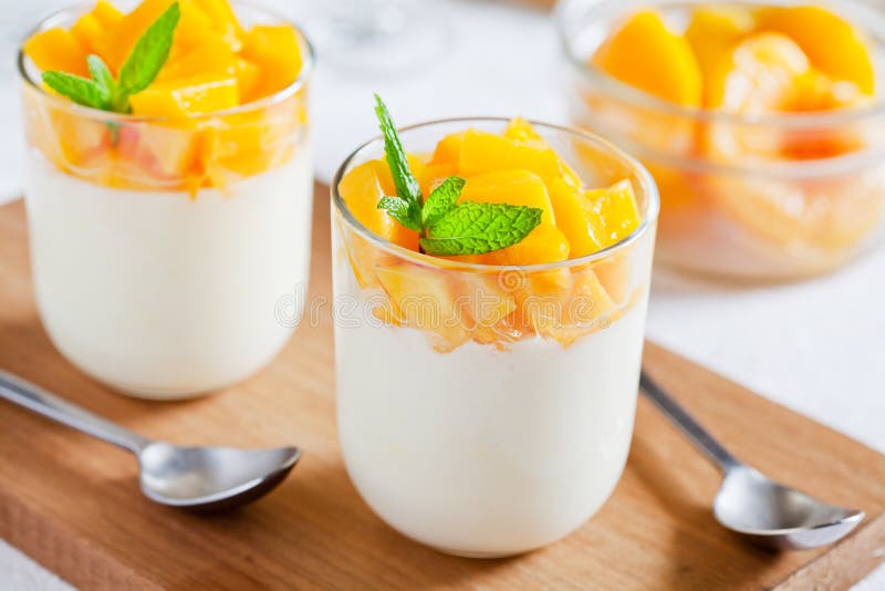 Glasses Of Yogurt With Poached Peaches