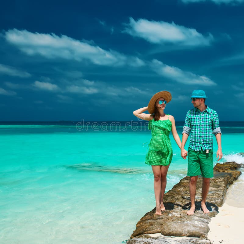 Couple in Green on a Beach at Maldives Stock Image Image of honeymoon
