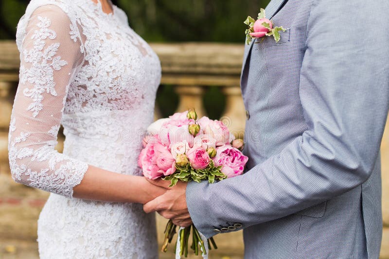 Couple hands on wedding