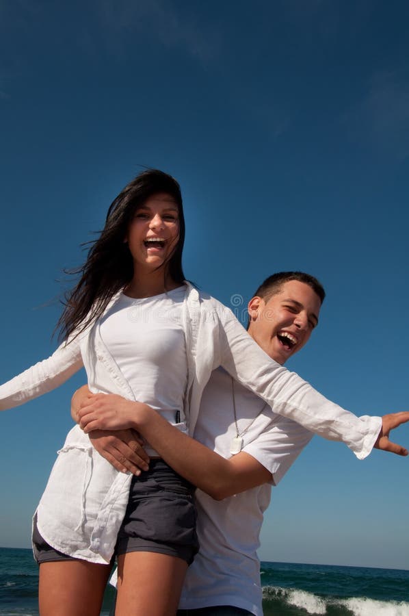 Couple having fun on the beach