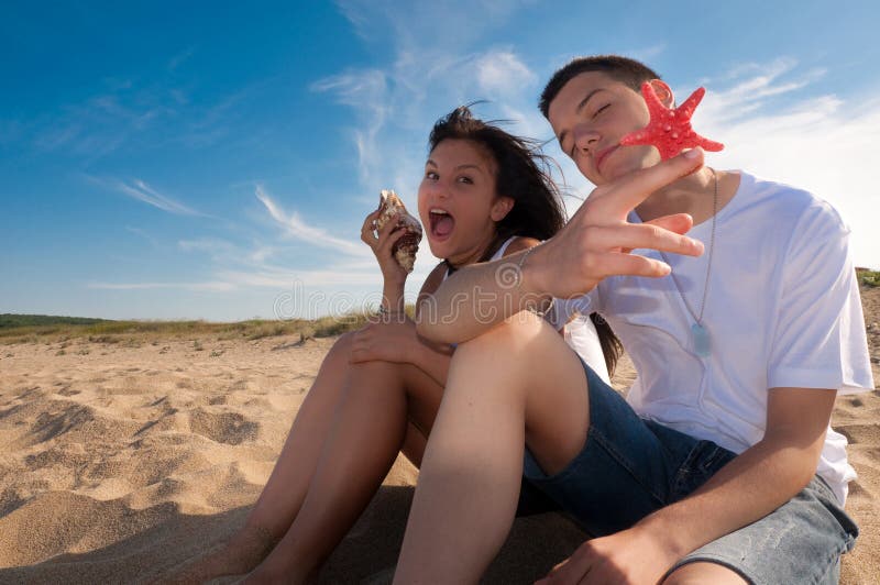 Couple having fun on the beach