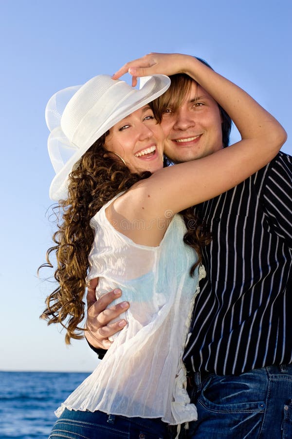 Couple having fun near sea